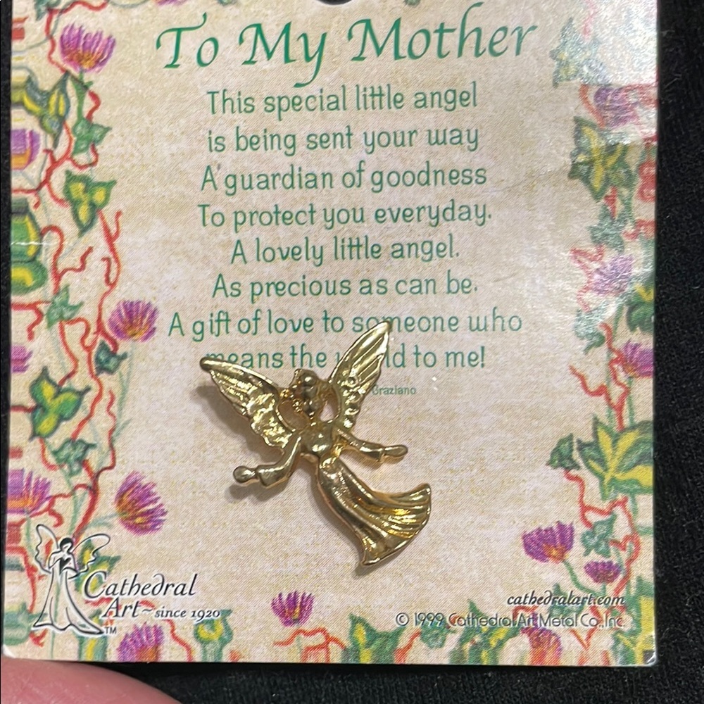 Gold Angel Brooch with Trumpet Design